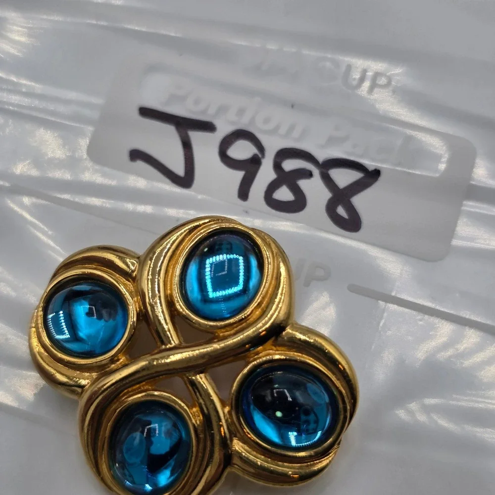 Vintage Monet Gold Tone Blue Glass Cabochon Quatrefoil Brooch Pin Abstract Retro